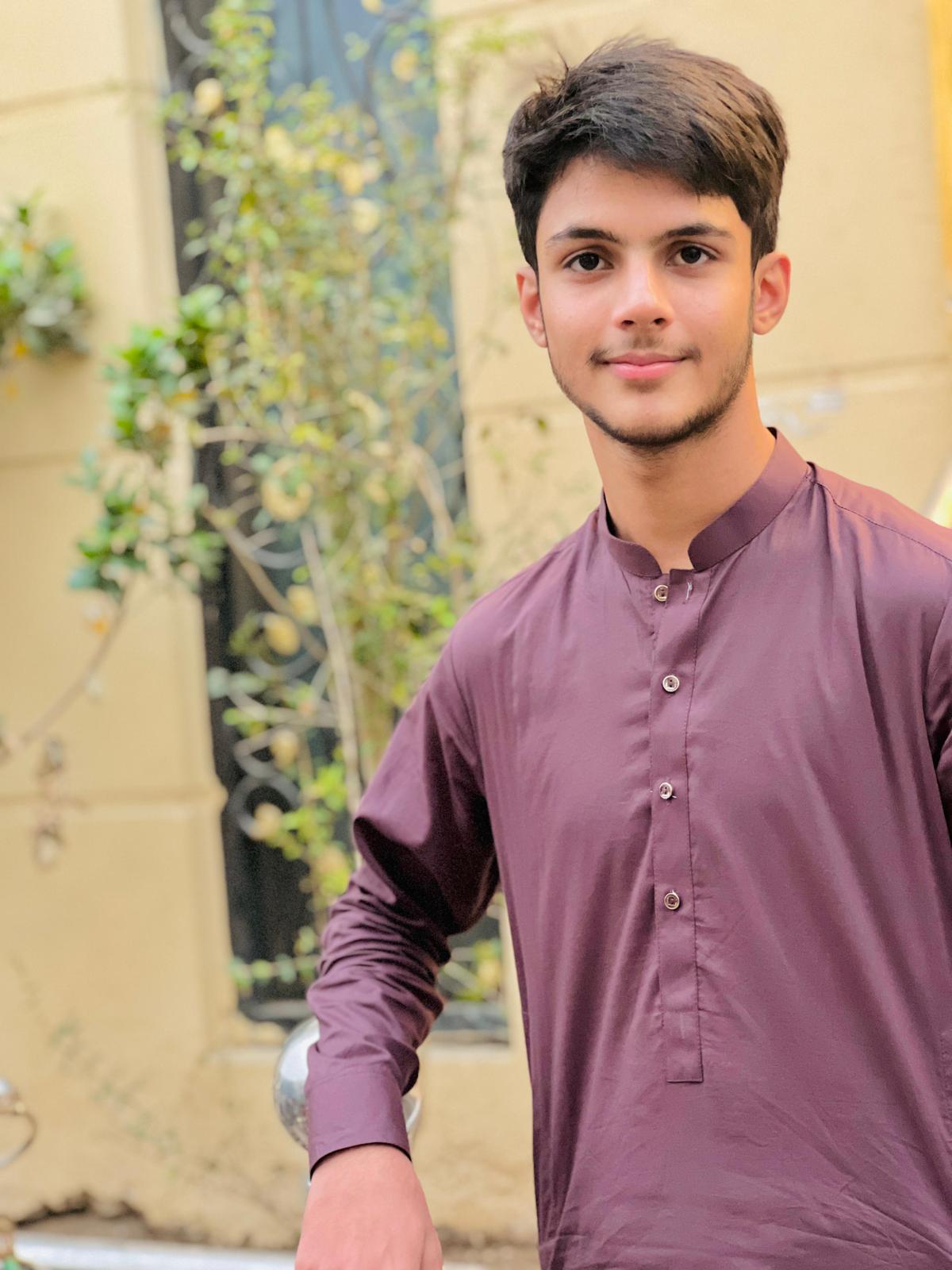 Direct Gaze — Professional portrait — eyes on the lens by Muhammad Umer Aziz